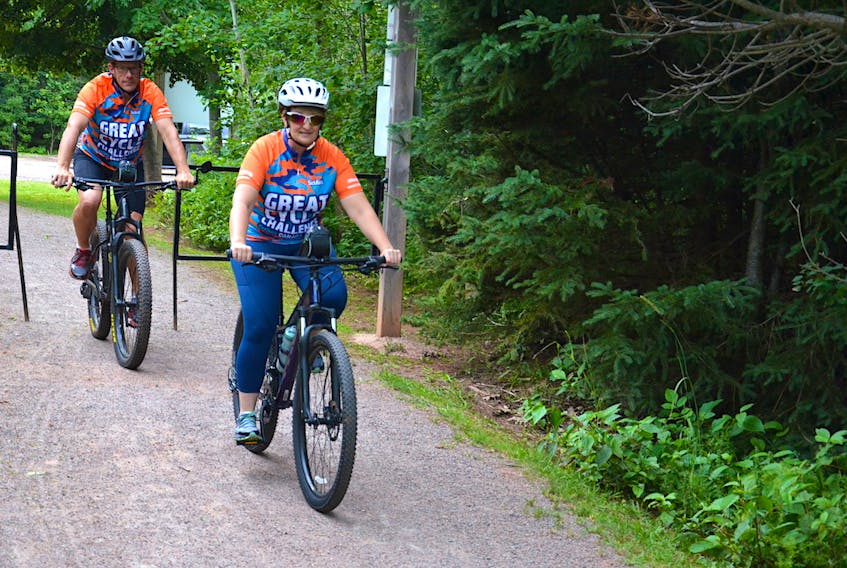 Jolline and Marcel Richard enter the trails at the Rotary Friendship Park in Summerside. The Summerside couple is cycling in the Great Cycle Challenge Canada for the Sick Kids Foundation for the second year in a row this month.
