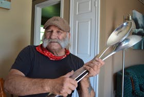 Brendon Peters, 67, of North Rustico has been playing the spoons since he was 12 years old. It was always music tradition in his family. And, his spoons come in all sizes, including this pair that are more than 1.5 feet in length.