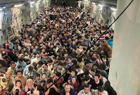 More than 600 Afghans crammed into a U.S. cargo plane on Aug. 15 in a desperate bid to flee Kabul and the Taliban. — Reuters file photo