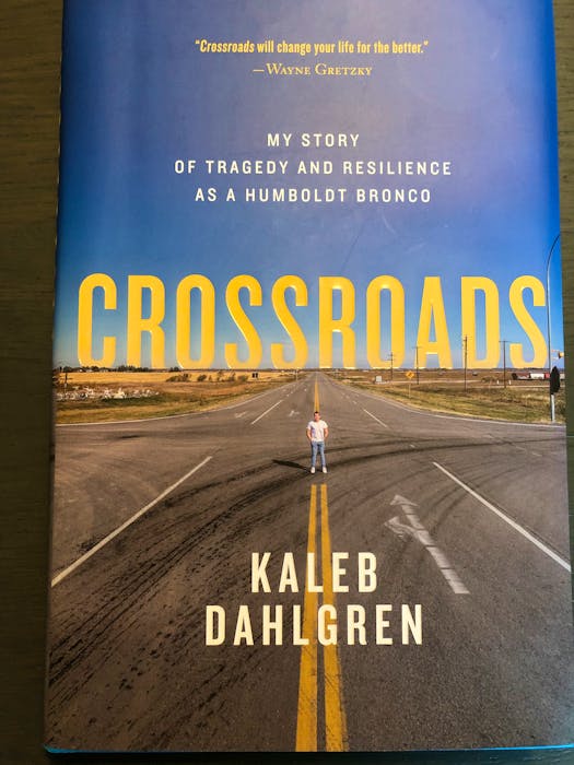 A photo of the cover of Kaleb Dahlgren's book Crossroads. - Jason Simmonds