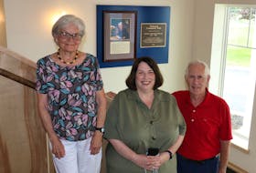 Ruth Ross, a daughter of the late Dorothy (Dot) Wellwood, Rev. Jennifer Riley, and Brian Bishop, the chairman of the Hantsport Baptist Church accessibility and hall improvement project, are pleased to announce the community hall is now open to the public.
