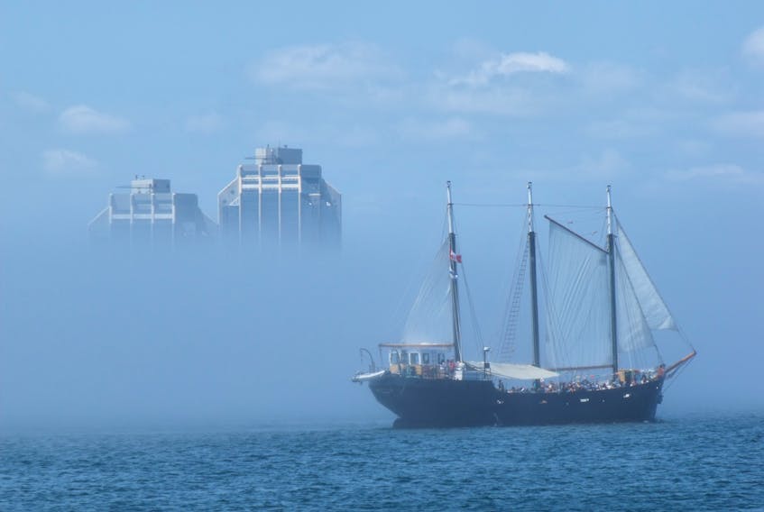 Ellen Cormier of Five Islands was recently in Halifax and snapped this photo of a boat shrouded in fog in the harbour. In the background, you can see the top few floors of the Purdy Wharf towers in downtown Halifax. Thanks, Ellen for this beautiful photo.