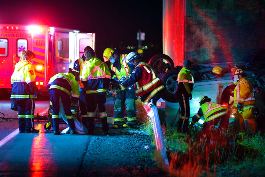 One person was taken to hospital following a single-vehicle rollover on Peacekeepers Way Sunday night. Keith Gosse/The Telegram