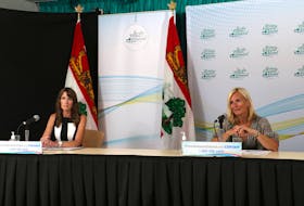 Chief public health officer Heather Morrison (right) and Education Minister Natalie Jameson take questions from media during a COVID-19 briefing on August 24. Morrison said the province would be maintaining screening at the border until at least mid-October, one month later than previously announced, in order to support a safe return to school.