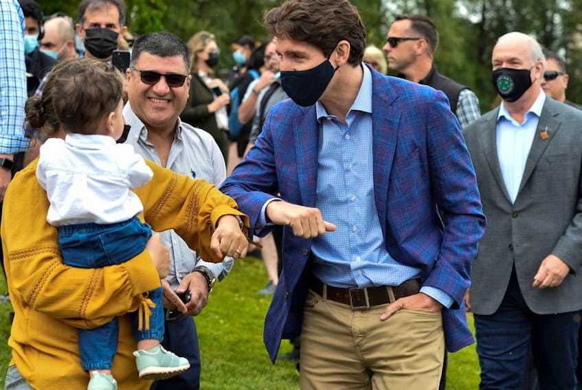Canada's Prime Minister Justin Trudeau greets people at Town Centre Park in Coquitlam, British Columbia, Canada July 8, 2021.  
