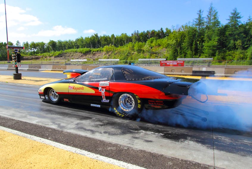 Kayward Bonnar of North Sydney, driving his Robin’s Donuts sponsored BBC Camaro came in second place in the Super Pro class at Cape Breton Dragway on Sunday afternoon. Bonnar lost to Jason MacNeil of Stellarton, driving his Geliget Gear-sponsored engine dragster. Local drag race resumes Sept. 3-5 at the Sydney facility. PHOTO CONTRIBUTED/GERARD BRYDEN.