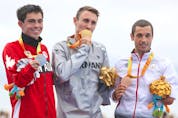  Silver medallist Stefan Daniel of Canada, from left, gold medallist Martin Schulz of Germany, bronze medallist Jairo Ruiz Lopez of Spain, in the PT4 Triathlon at the Rio Paralympics on Sept. 10, 2016.