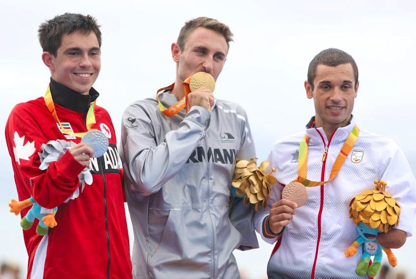  Silver medallist Stefan Daniel of Canada, from left, gold medallist Martin Schulz of Germany, bronze medallist Jairo Ruiz Lopez of Spain, in the PT4 Triathlon at the Rio Paralympics on Sept. 10, 2016.