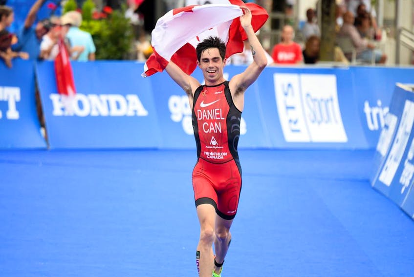 Calgary's Stefan Daniel celebrates his fourth world paratriathlon title in 2019. (Courtesy of World Triathlon.)