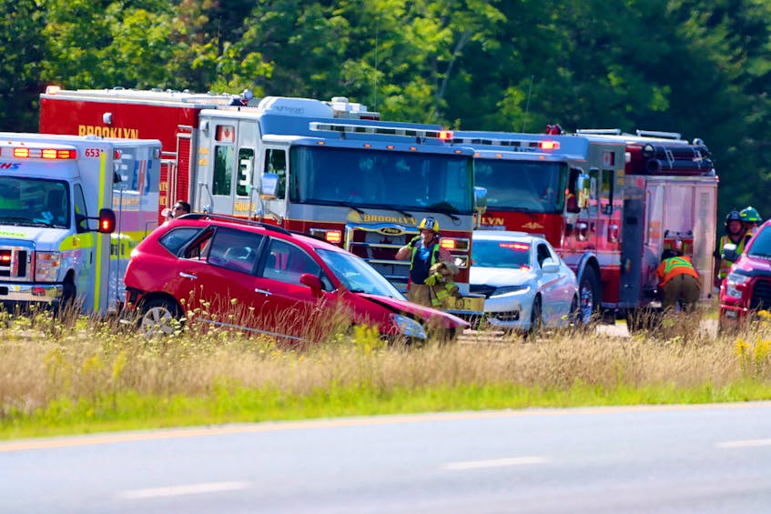 It was a hot and humid day for emergency first responders as they helped extricate patients from a crashed vehicle on the 101-series highway. — ADRIAN JOHNSTONE 