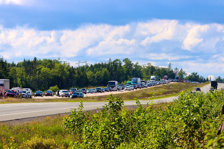 Traffic was backed up in the eastbound lane of Highway 101 near Stillwater for as far as the eye could Aug. 24 see while crews worked to free patients following a motor vehicle accident. — ADRIAN JOHNSTONE