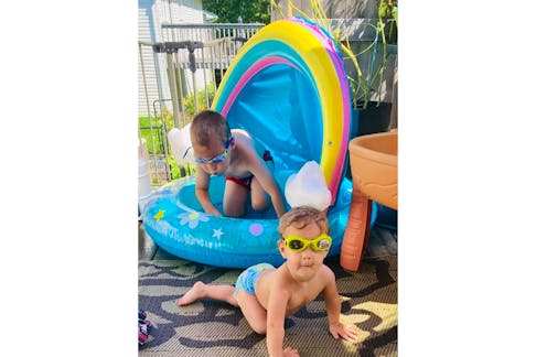 You don't have to go very far to find some relief from the heat. Nicole Moore watched as two of her children, Taylor (4) and Everly (1), had a blast and a splash or two on their back deck in Timberlea, N.S.