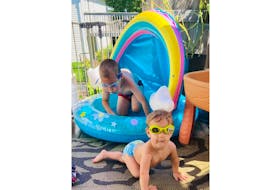 You don't have to go very far to find some relief from the heat. Nicole Moore watched as two of her children, Taylor (4) and Everly (1), had a blast and a splash or two on their back deck in Timberlea, N.S.