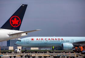 Air Canada planes parked at Toronto Pearson Airport in Mississauga, Ont., on April 28, 2021. 