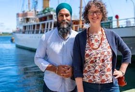 Lisa Roberts, the NDP candidate for the Halifax riding in the Sept. 20 federal election, stands along the Halifax waterfront with federal party leader Jagmeet Singh.