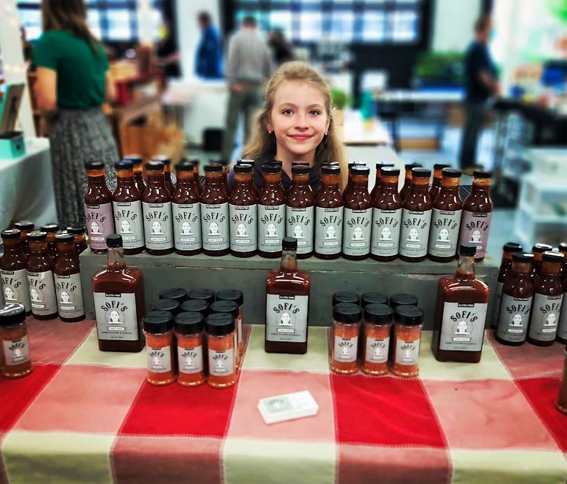 Sofi Veniott, 9, of Truro and her dad Chris are regular vendors at the Truro Farmers' Market with their Sofi's BBQ Sauce and meat rubs. - Contributed