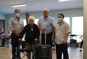 Marcel Richard, Marie Anne Arsenault, Rene Richard and Joey Casey welcomed back residents to Le Chez-Nous Cooperative, during a press conference on Thursday, Aug. 26.