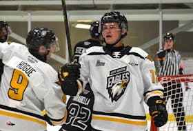 Jack Campbell of the Cape Breton Eagles, right, celebrates after scoring the first of two goals during Quebec Major Junior Hockey League preseason action at Miners Forum in Glace Bay on Friday. Cape Breton won the game 5-2. JEREMY FRASER/CAPE BRETON