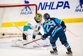 Marie-Philip Poulin scores a shorthanded goal as Team Bauer, based in Montreal, defeated Team Sonnet, based in Toronto, 3-2 to kick off their PWHPA Dream Gap Tour in May 2021. - Dave Holland / PWHPA