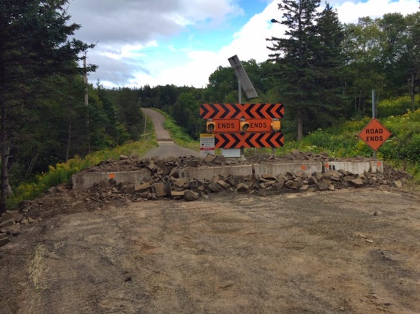 The Department of Transportation and Infrastructure Renewal has placed rock in an apparent effort to further fortify a concrete barricade on Russia Road near Harbourville. CONTRIBUTED