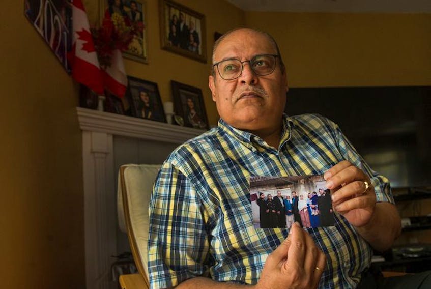  Hakim Zazem at his home in New Westminster. Zazem, who emigrated to Canada 24 years ago, is worried sick about his six siblings and their 25 children who are still in Afghanistan and in fear of the Taliban.