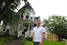 Sven Gerhard, in front of his home, and his partner, Normand Lechelt, moved from Vancouver, B.C., to Summerside about a year ago. Gerhard has been documenting their East Coast adventures on his YouTube channel, Canadian Life, the whole time. He credits the channel with helping them make friends and connections in P.E.I. 