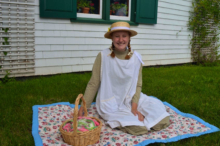 Anne Shirley takes a moment to enjoy the bright warm sunshine outside her Green Gables home in Cavendish. - Dave Stewart • The Guardian
