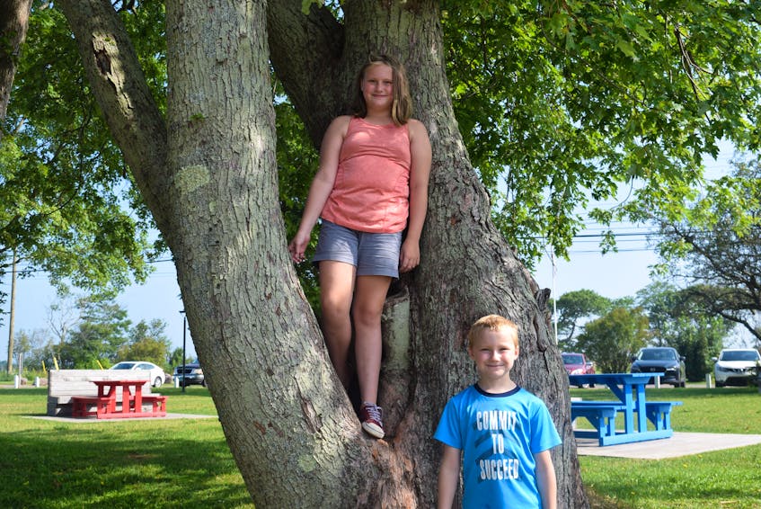 Siblings Jade and Drew Barbrick, ages 7 and 11, are going back to school and hope more people get vaccinated.  - Chelsey Gould