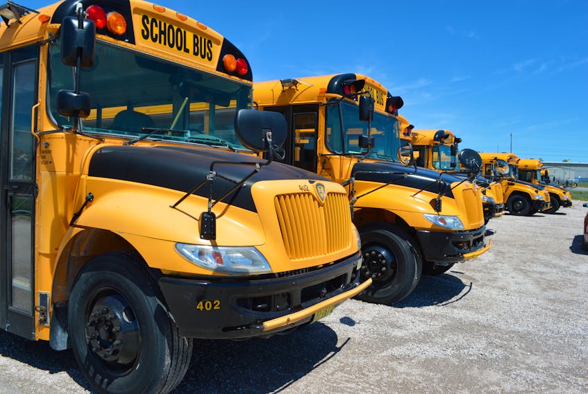 In this file photo, school buses are parked at the Cape Breton-Victoria Regional Centre for Education transportation and maintenance facility on the Sydney Port Access Road in Sydney.  Sharon Montgomery/Cape BRETON POST