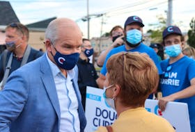 Conservative Party of Canada leader Erin O'Toole speaks with a supporter at a 2021 campaign stop in Charlottetown on August 28. 