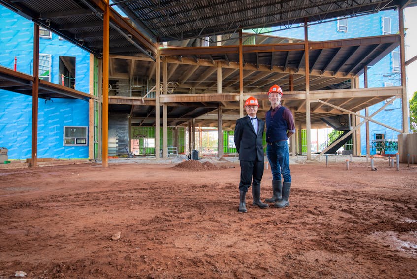 From left to right: Ph.D. Karem Simon and Ph.D. Greg Doran at the construction site of a new UPEI residence building that will include a new performance venue. 