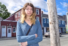 Hailey O’Day of Sydney stands outside her third-floor apartment on Townsend Street in Sydney, where she says she has been living for about 11 months in an unsafe, mouse-infested apartment. O’Day says there’s a huge housing issue in the Cape Breton Regional Municipality and she can’t find anywhere else to go. Sharon Montgomery-Dupe/Cape Breton Post
