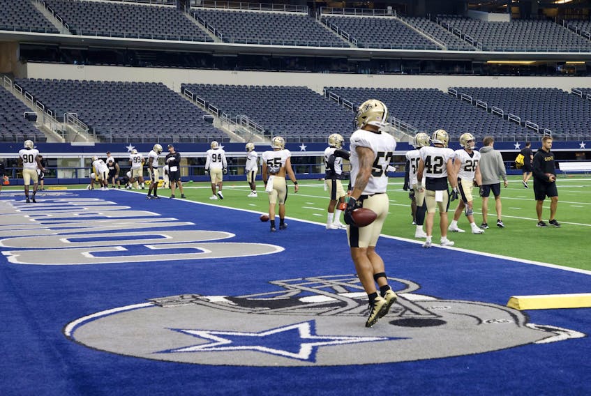 The New Orleans Saints participate in an NFL football workout at AT&T Stadium in Arlington, Tex., on Monda.