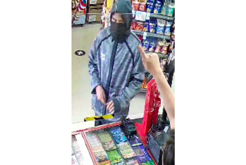 RNC said a lone suspect entered a First Street business on July 25 and approached the cashier with a weapon, demanding cash and cigarettes.