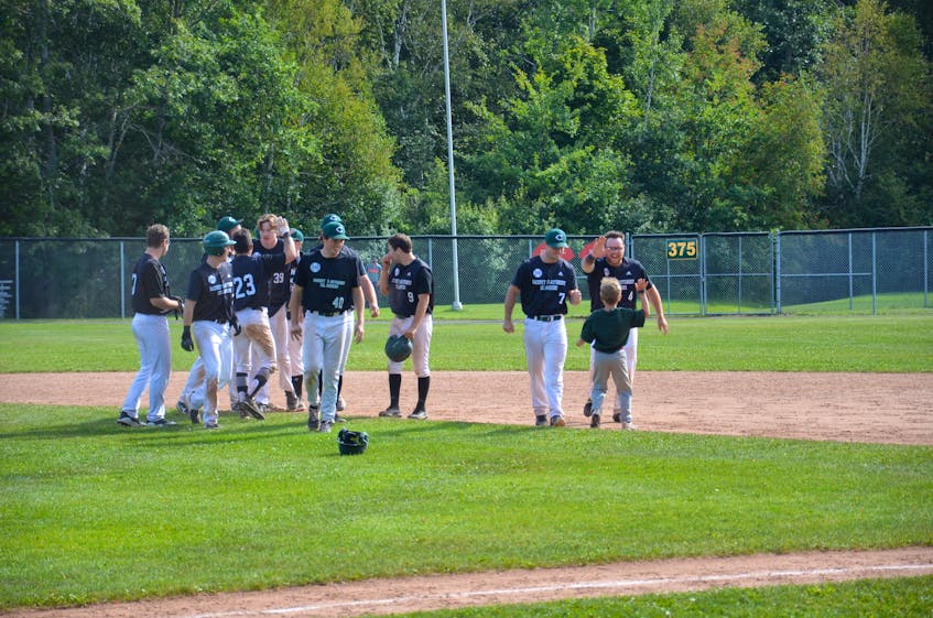 The Charlottetown Gaudet’s Auto Body Islanders celebrate a 5-4 walk-off win over the Saint John Alpines at Memorial Field on Aug. 29. The best-of-seven New Brunswick Senior Baseball League semifinal series is tied 1-1. Game 3 is in Saint John on Aug. 31, with Game 4 back in Charlottetown on Sept. 1 at 8 p.m. - Jason Simmonds