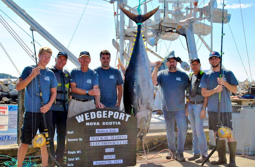 The crew of the Robyn Jade pose for a photo at the Wedgeport Tuna Tournament and Festival virtual weigh-in on Aug. 21.  The crew took home the award for the overall combined heaviest weight of the catches at 1688 pounds. KATHY JOHNSON - Kathy Johnson