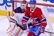 Montreal Canadiens' Jesperi Kotkaniemi sets up in front of Edmonton Oilers goalie Mikko Loskinen during second period in Montreal on May 10, 2021. 