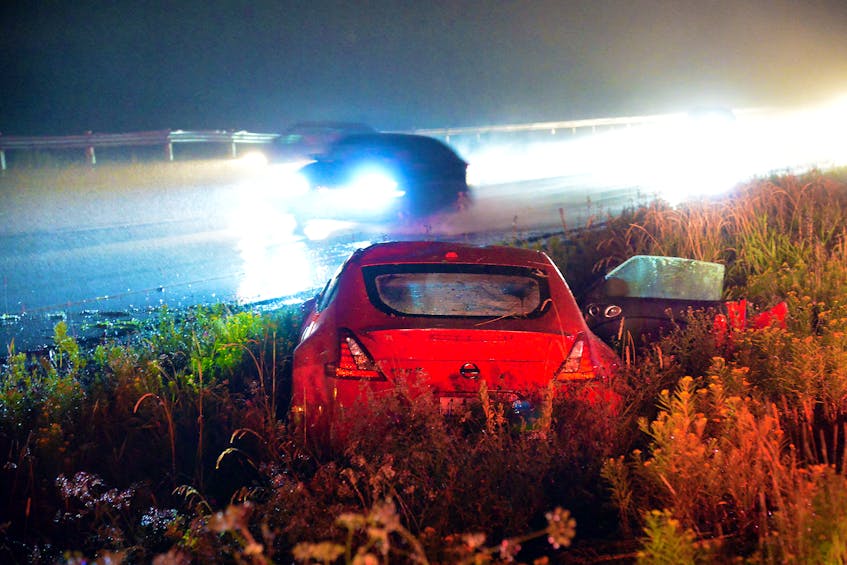 One man was sent to hospital following a single vehicle rollover on the Outer Ring Road Tuesday night. Keith Gosse/The Telegram