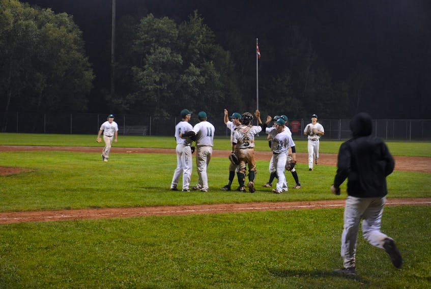 The Capital District Islanders congratulate each other after an exciting 4-3 win over the Summerside Toombs and MacDougall CPA Chevys on Aug. 30. The best-of-five final series in the Island Junior 22-Under Baseball League is tied 2-2. The fifth and deciding game is at Queen Elizabeth Park's Legends Field in Summerside on Sept. 2 at 8 p.m.