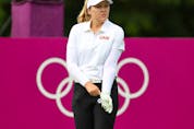 Brooke Henderson of Canada looks on during the opening round of Olympic golf.