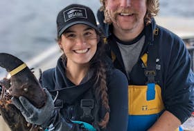 Eastern Passage fisherman Justin Stewart and his wife, Jaime Wertman, aboard their fishing boat.