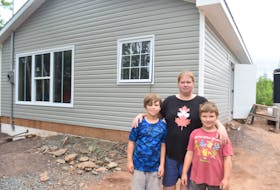 Elaine Heighton, shown with sons Chesney and Ryker, is hoping her family will be able to move into their new Tatamagouche home within the next few weeks. 