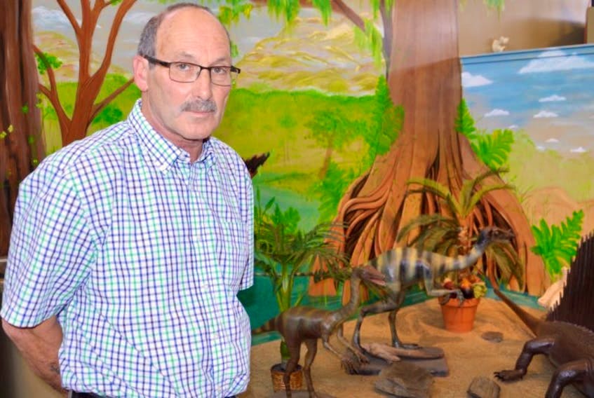 Stuart Critchley, curator of the Sydney Mines Heritage Society, stands in front of a display at the Cape Breton Fossil Centre in Sydney Mines in this file photo. Critchley and society founder Jim Tobin recently stepped aside after spending decades operating the fossil centre, Sydney Mines Heritage Museum and Sydney Mines Sports Museum. CAPE BRETON POST FILE