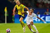 Fridolina Rolfo of Sweden is challenged by Ashley Lawrence of Canada during the 2019 FIFA Women's World Cup France Round Of 16 match between Sweden and Canada at Parc des Princes on June 24, 2019 in Paris, France. 