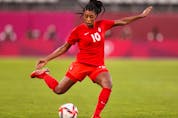 Ashley Lawrence of Team Canada makes a pass during the Women's Semi-Final match between USA and Canada at the Tokyo Olympic Games at Kashima Stadium on August 02, 2021 in Kashima, Ibaraki, Japan. 