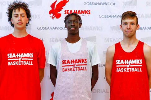 These three former St. John’s high school basketball stars are among the latest recruits for the MUN men's basketball team. Shown (from left) are Nicholas Edwards from Waterford Valley, Liai Tong from Holy Heart of Mary and Nathan Childs from  Gonzaga have all committed to the Memorial program. — Contributed