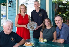 Left to right: Shane Campbell, owner of Water Prince, Melody Dover, president of Fresh Media, Coady Campbell, manager of Water Prince, Charlotte Campbell, marketing director of Lobster P.E.I., minister Jamie Fox, Dept. Fisheries and Communities.