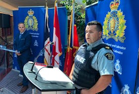 RCMP Staff Sgt. Adam Palmer (left), of the RCMP’s Newfoundland and Labrador federal serious and organized crime unit, and Sgt. Kenneth Maher, district commander for the RCMP in the Trinity-Conception area, at a news conference Aug. 4 at RCMP Headquarters in St. John’s. Joe Gibbons • The Telegram