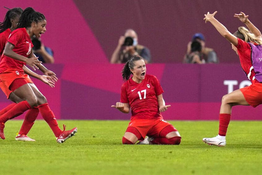  Canada’s Jessie Fleming, 17, celebrates scoring the opening goal from the penalty spot during a women’s semifinal soccer match against United States at the 2020 Summer Olympics, Monday, Aug. 2, 2021, in Kashima, Japan.
