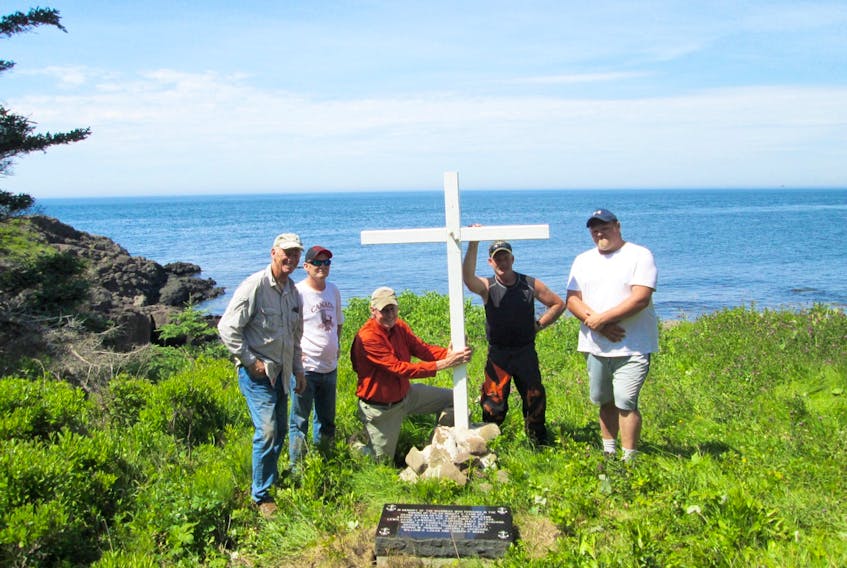 A 2019 refurbishment of the memorial at Riley's Cove for those who perished from the SS Robert G. Cann in 1946. (From Left to Right) Craig Stencil, visiting from Texas and Chip’s brother-in-law; Jerry Titus of Yarmouth; Manning "Chip" Gasch of Trout Cove, Digby County; Craig Pyne of Centreville, Digby County and Jesse Gidney of Centreville, Digby County. CONTRIBUTED